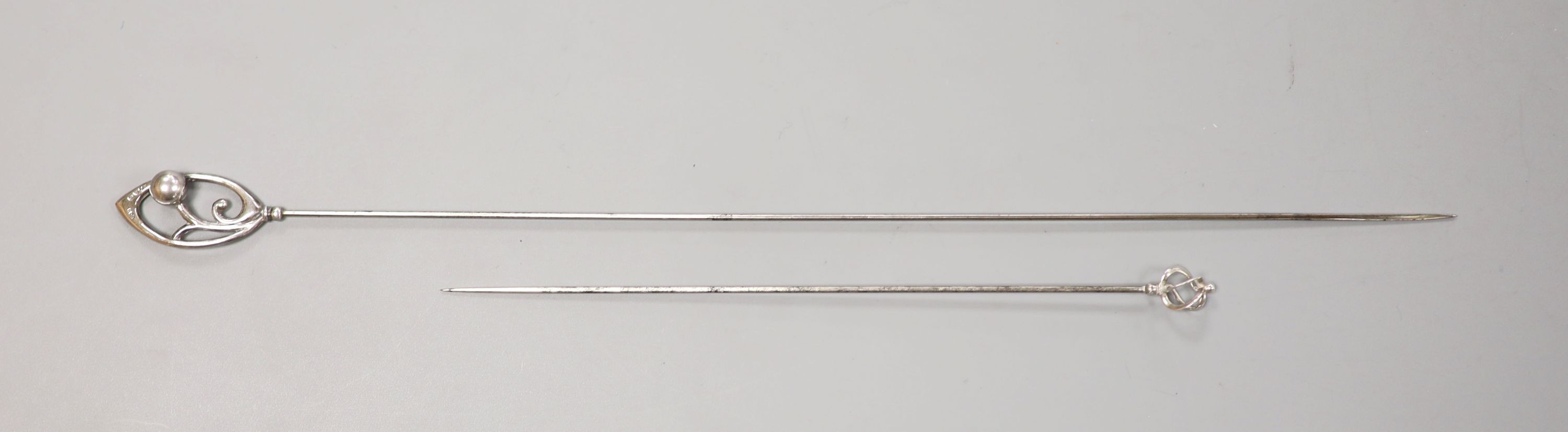 Two early 20th century silver hatpins by Charles Horner, longest 29cm.